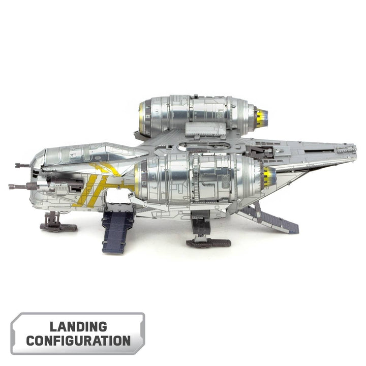 A detailed Metal Earth Mandalorian Razor Crest Star Wars Premium DIY model in silver with yellow accents and deployed landing gear. "LANDING CONFIGURATION" is shown in a gray box at the bottom left.