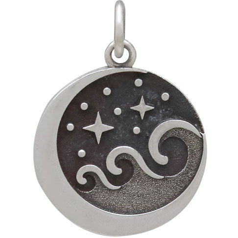 The Nina Designs Starry Night Wave Pendant is a round sterling silver charm featuring a crescent moon, two stars, and wavy sea lines against oxidized night skies with dotted accents for smaller stars.