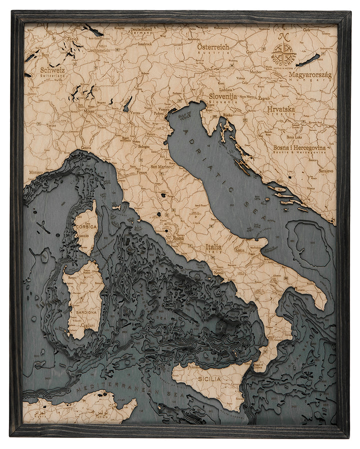 The WoodChart Italy 24.5" x 31" Grey Frame is a nautical wood map that engraves coastlines, islands, and major cities in birch with dark-toned seas, showcasing Italy and surrounding countries in a striking display.