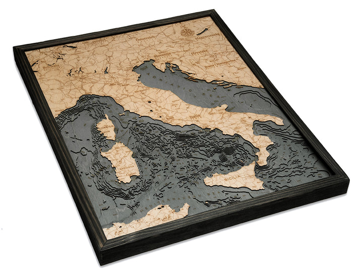 The WoodChart Italy 24.5" x 31" Grey Frame features a layered wooden map with topographic details of Italy and its surroundings, labeled place names, islands, and varying ocean depths in a stylish grey frame.
