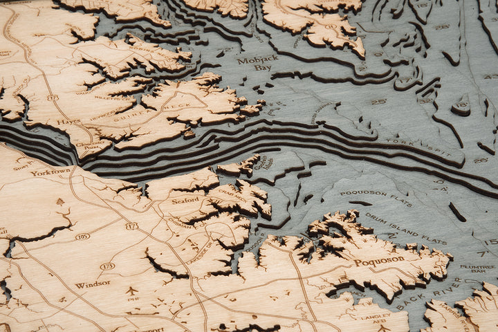 The WoodChart Norfolk VA 24.5 x 31 GreyFrame is a laser-cut wood map featuring detailed topographic layers and labeled roads and water features around Norfolk, Virginia.