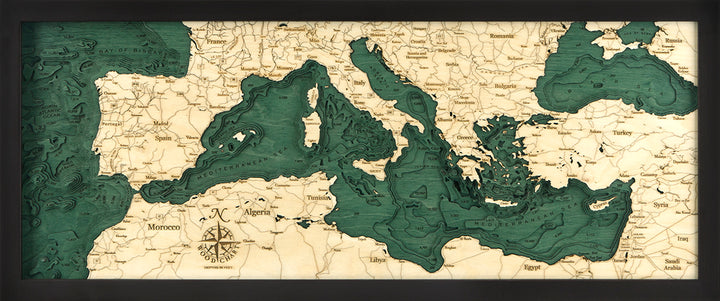 WoodChart's Mediterranean Sea 13.5" x 31" Black Frame features a vintage-style map showing southern Europe, northern Africa, and the Middle East with shaded green water and beige land areas.