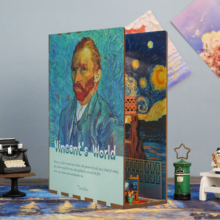 The DIY Book Nook Kit: Vincent's World by Hands Craft features a vibrant Van Gogh portrait cover, "Starry Night" artwork, and comes with art-themed decorations, a typewriter, and a Van Gogh bookshelf insert for a creative display.