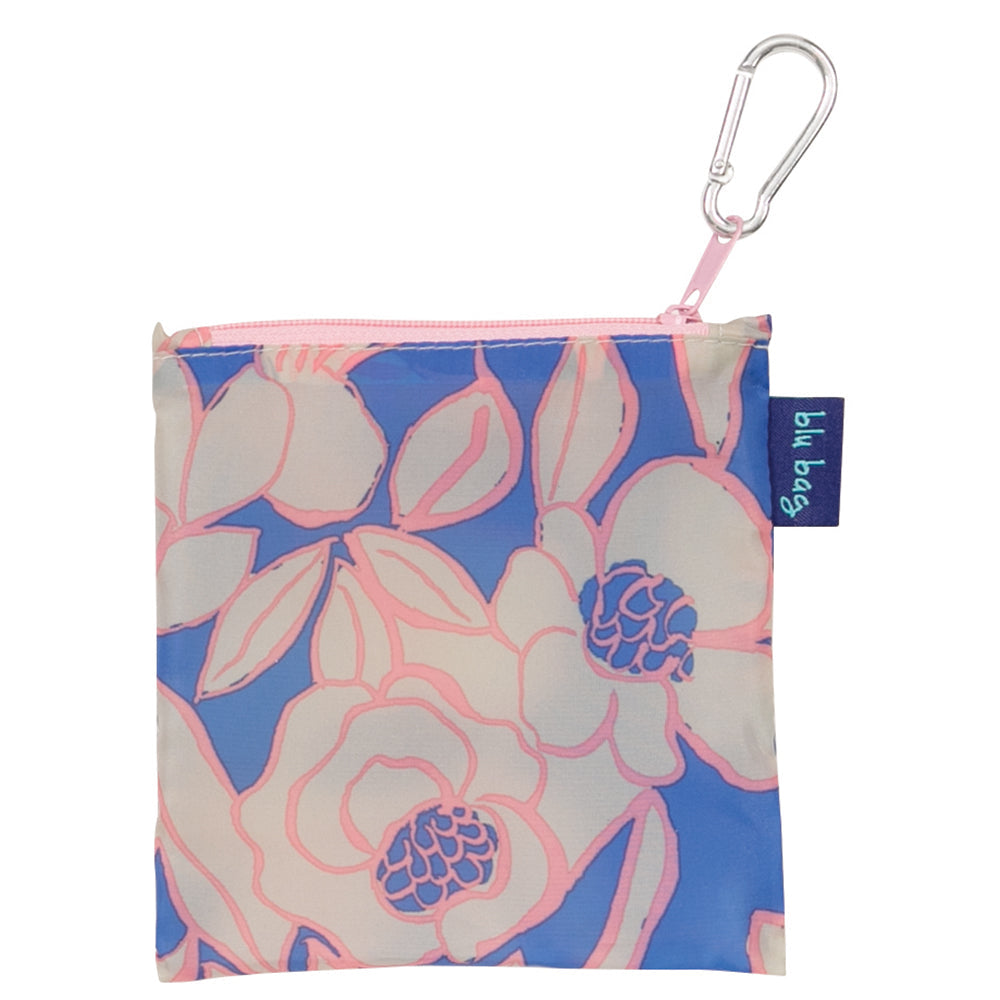 The Rosaliei Reusable Bag by zzzRockFlowerPaper is a compact fabric pouch, showcasing a pink and white floral pattern on a blue backdrop. Its eco-friendly design includes a pink zipper and a metal carabiner clip, ideal for attaching to your reusable shopping bag.