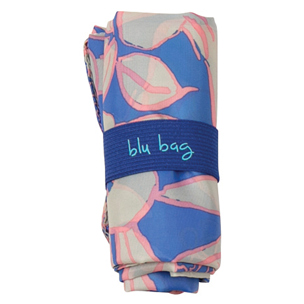 Introducing the Rosaliei Reusable Bag from zzzRockFlowerPaper: a rolled-up shopping bag that stays secure with its signature blue band. Its vibrant pattern of blue and pink abstract shapes on a light background offers both style and an eco-friendly solution.