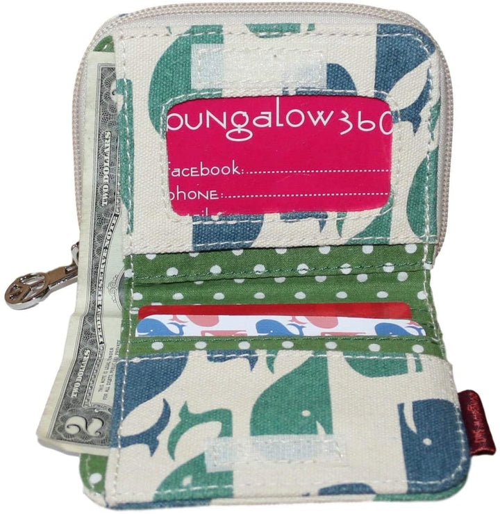 The Bill Fold Wallet Whale by Bungalow 360 features a green and white pattern with unique animal designs. It opens to reveal various pockets for a $2 bill, credit card, and social media info card. Unzipped and upright, it's ideal for those who love distinctive designs and support animal causes.
