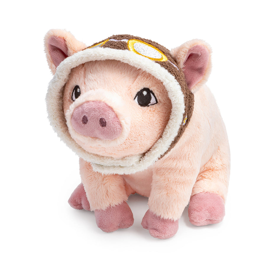 The Flying Pig Plush by Compendium features a soft, light pink body with darker pink hooves and sits facing forward. It dons a charming brown and white aviator hat complete with aviator goggles. With its large, round eyes and small, rounded ears, this adorable piglet makes the perfect gift for any dreamer on any occasion.