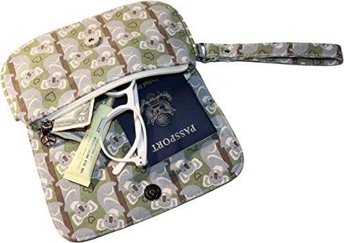 The Large Wristlet Koala by Bungalow 360 is a cotton canvas pouch with cartoon koala designs. It features a wrist strap and bottom button, revealing a passport, white glasses, and a tag inside.