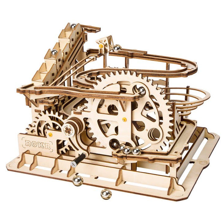 The DIY Marble Run Parkour by Hands Craft is a captivating 3D wooden puzzle featuring intricate gears and tracks, where silver marbles navigate winding paths resembling a waterwheel coaster, showcasing meticulous engineering with a natural wood finish.