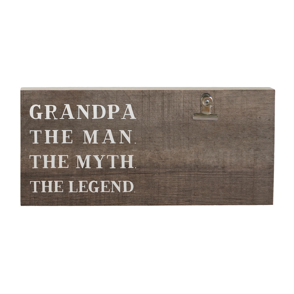 The "Grandpa The Man Photo" by SincereSurroundings is a charming handcrafted wooden plaque featuring white text that reads "GRANDPA THE MAN. THE MYTH. THE LEGEND." It includes a metal photo clipboard on the right side, ideal for displaying cherished memories from Rock Rapids, IA and beyond.