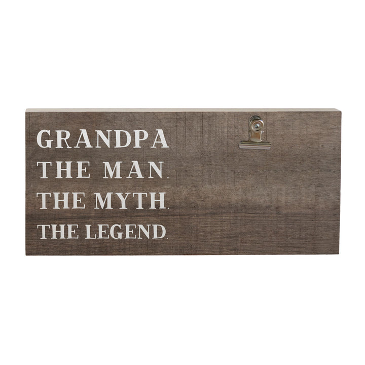 The "Grandpa The Man Photo" by SincereSurroundings is a charming handcrafted wooden plaque featuring white text that reads "GRANDPA THE MAN. THE MYTH. THE LEGEND." It includes a metal photo clipboard on the right side, ideal for displaying cherished memories from Rock Rapids, IA and beyond.