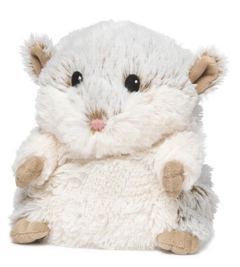 A cute, fluffy stuffed animal resembling a hamster with round black eyes, a small pink nose, and beige paws and ears. This off-white plush toy has beige accents, is soft and cuddly, and belongs to the Hamster Junior Warmie collection by Warmies. Filled with French Lavender, it's also microwave-safe for added warmth.