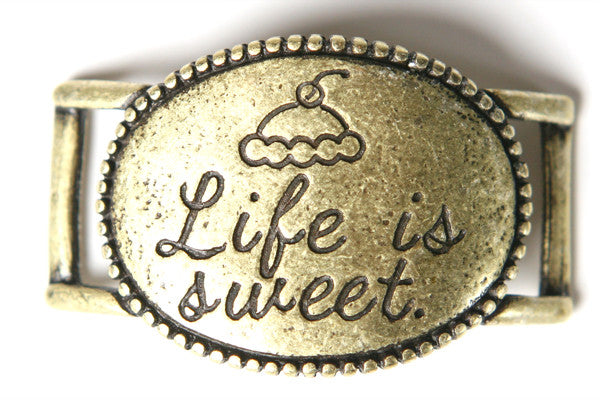 Life is Sweet. antique brass - Across The Way