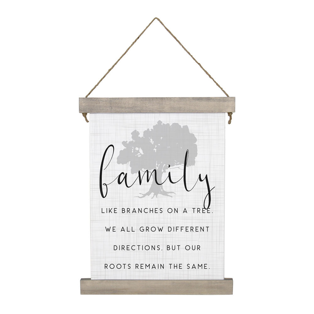 The "Family Like Branches" sign by SincereSurroundings is a stained wood-framed hanging decoration displaying the word "family" in bold cursive. It includes the sentiment: "Like branches on a tree, we all grow different directions. But our roots remain the same." A subtle tree silhouette serves as the background, enhanced with twine detailing.