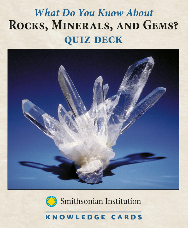 A cover image of the "Rock Mineral and Gem Knowledge Cards" quiz deck by Pomegranate. The cover features a detailed photograph of a clear quartz crystal against a blue background reminiscent of crystalline caves. The bottom shows the Smithsonian Institution's logo.