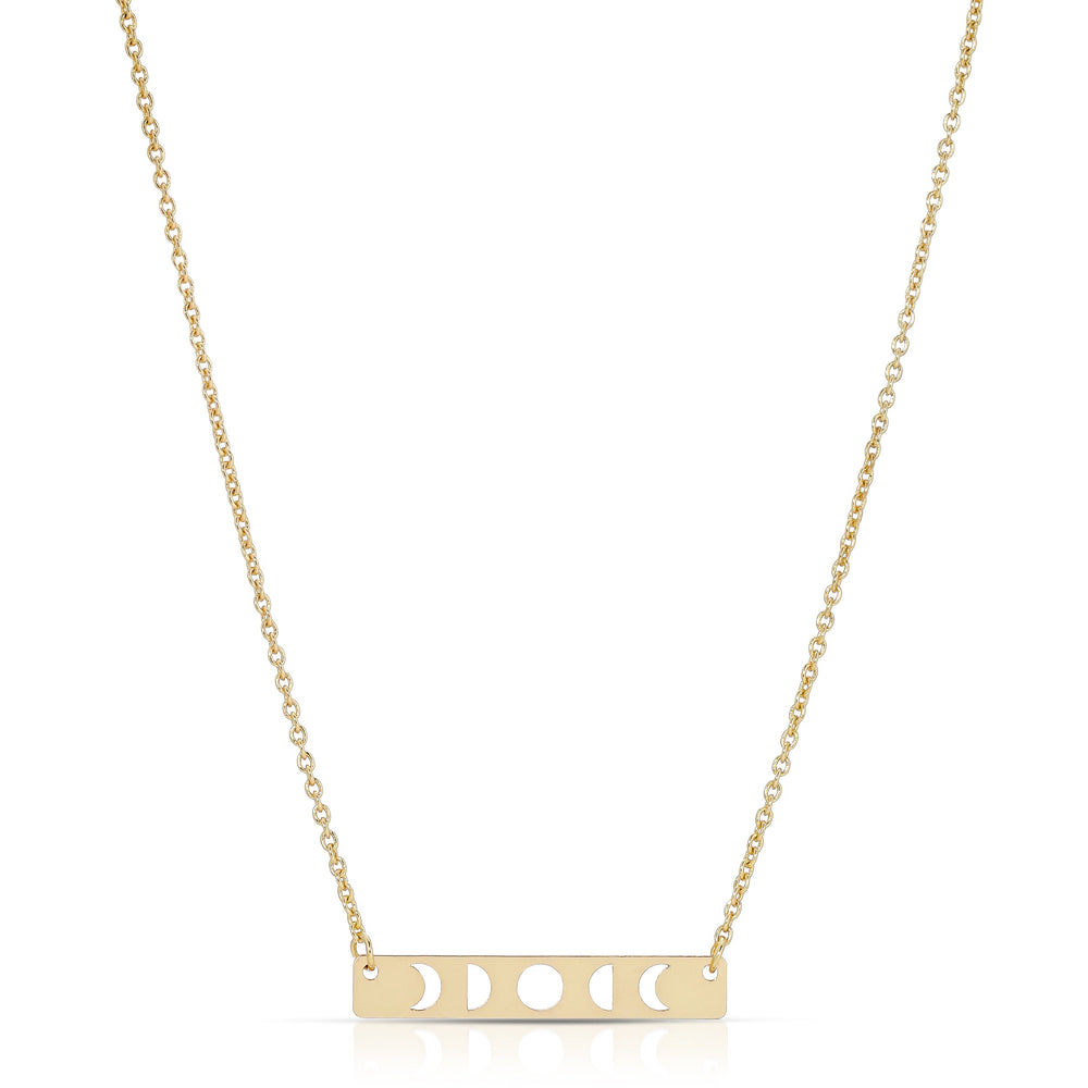 The LuckyFeather Moon Phase Necklace Gold features a 14k gold-dipped brass rectangular pendant with moon phase cut-out designs, perfect for astrology fans, and is elegantly suspended on a delicate chain.