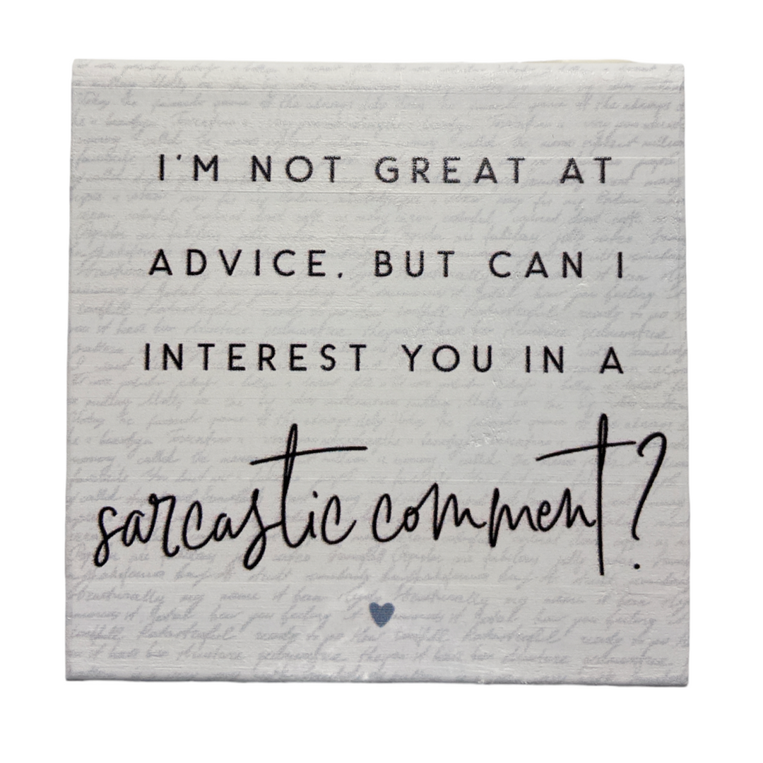 The "Sarcastic Comment" from SincereSurroundings displays the phrase, "I’m not great at advice. But can I interest you in a sarcastic comment?" over a white square with a faint script background. With its handcrafted charm, this piece is ideal for shelf display and features a small heart icon at the bottom center.