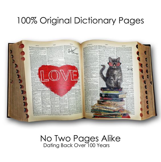 A dictionary spread displays "LOVE" written inside a red heart on one page and a cat with glasses on stacked books on the other. Above, it reads "100% Original Dictionary Pages"; below, "No Two Pages Alike, Dating Back Over 100 Years." Unique handmade USA art prints by VintageDictionary.