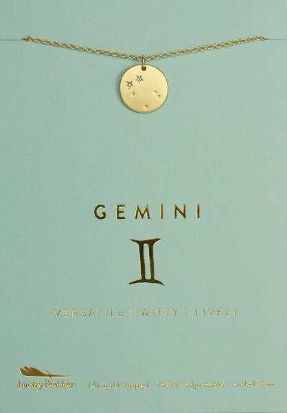 Displayed against a green background is the gold Zodiac Necklace Gemini, featuring a circular pendant adorned with star symbols. The text reads "GEMINI" and highlights traits such as "Versatile | Witty | Lively," along with the brand "LuckyFeather.