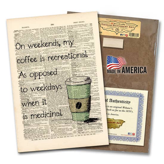 A VintageDictionary art print titled "On Weekends my coffee" features a coffee cup illustration on a vintage-style dictionary page with the text: "On weekends, my coffee is recreational. As opposed to weekdays when it is medicinal." It's packaged as "Handmade in the USA," exuding nostalgic charm.